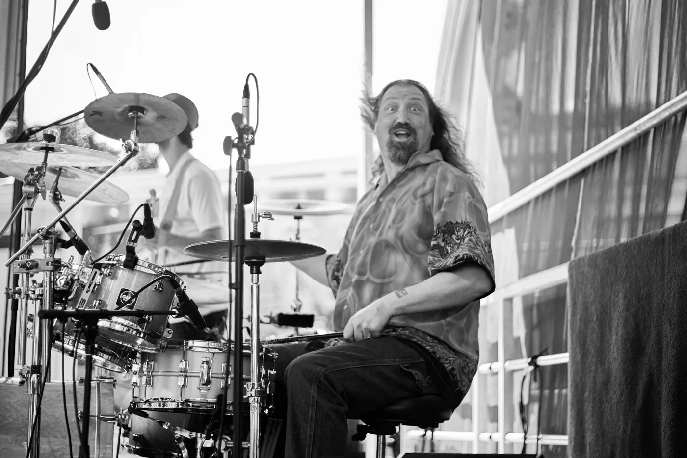Brett Behrens performing at his drum kit