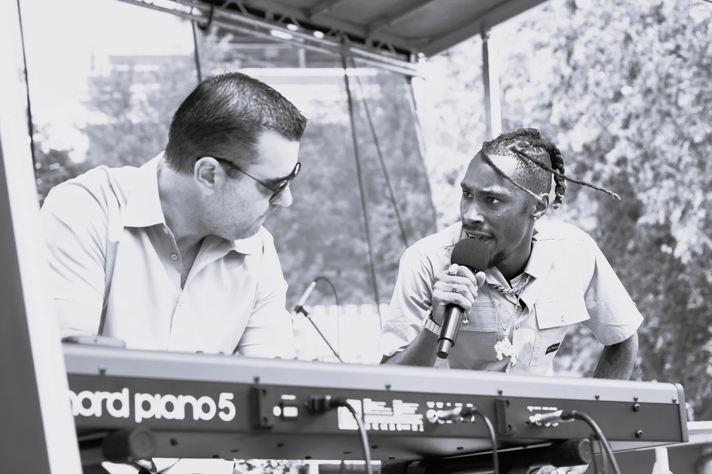 Brad and Abraham performing together at the keyboard
