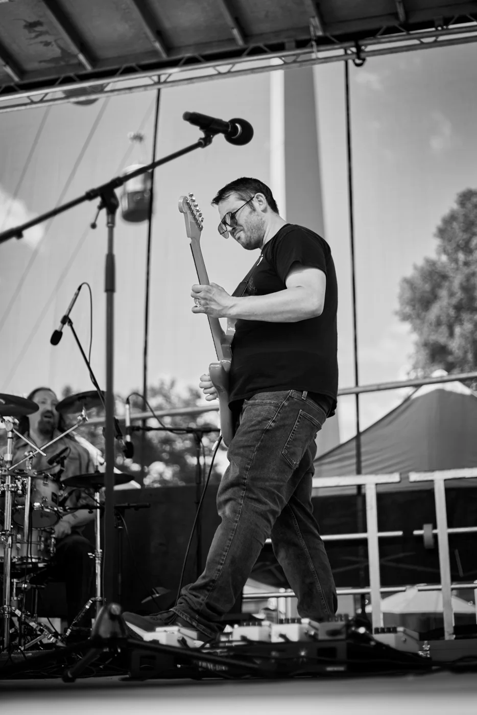 Marc Jesberg playing guitar on stage