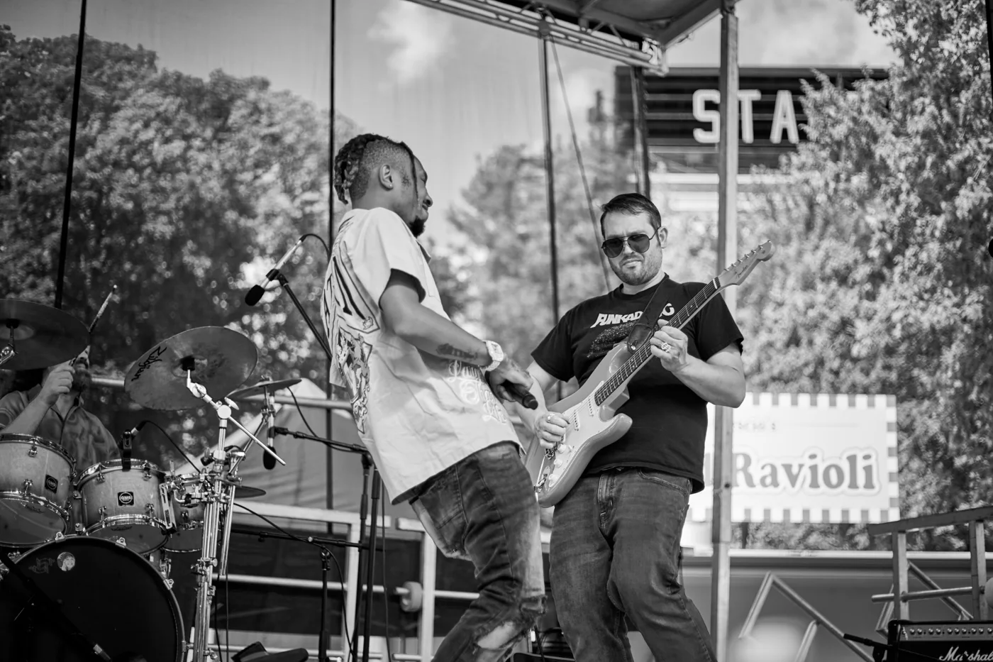 Abraham and Marc sharing a moment during a performance